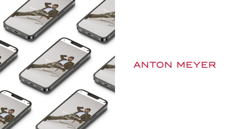 Anton Meyer Projektbanner – auf der linken Seite sind Mockups der mobilen Website des Anton Meyer Onlineshops auf Basis von Woocommerce zu sehen, auf der rechten Seite das Logo des Shops in rot auf weißem Hintergrund.